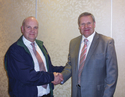 Outgoing TRA chairman Philip Bell (left) and new chairman Alan Howard