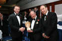 John Wright was presented with an NPPD Lifetime Achievement Award. From left: Nigel Williams, NPPD chairman, John Wright and Kevin Hayes, TTF president