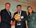 Softwood Trader of the Year (from left): John Abbott from sponsor Arch Timber Protection; Simon Henry from winner Crown Timber; and Sarah Beeny
