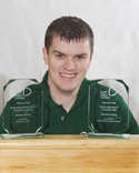 Stephen Young with his two awards