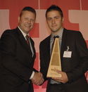 Shaun Smith of West Port, under-25 winner of the TTJ Career Development Award 2009, accepts his trophy from SCA Timber Supply sales director Stephen King
